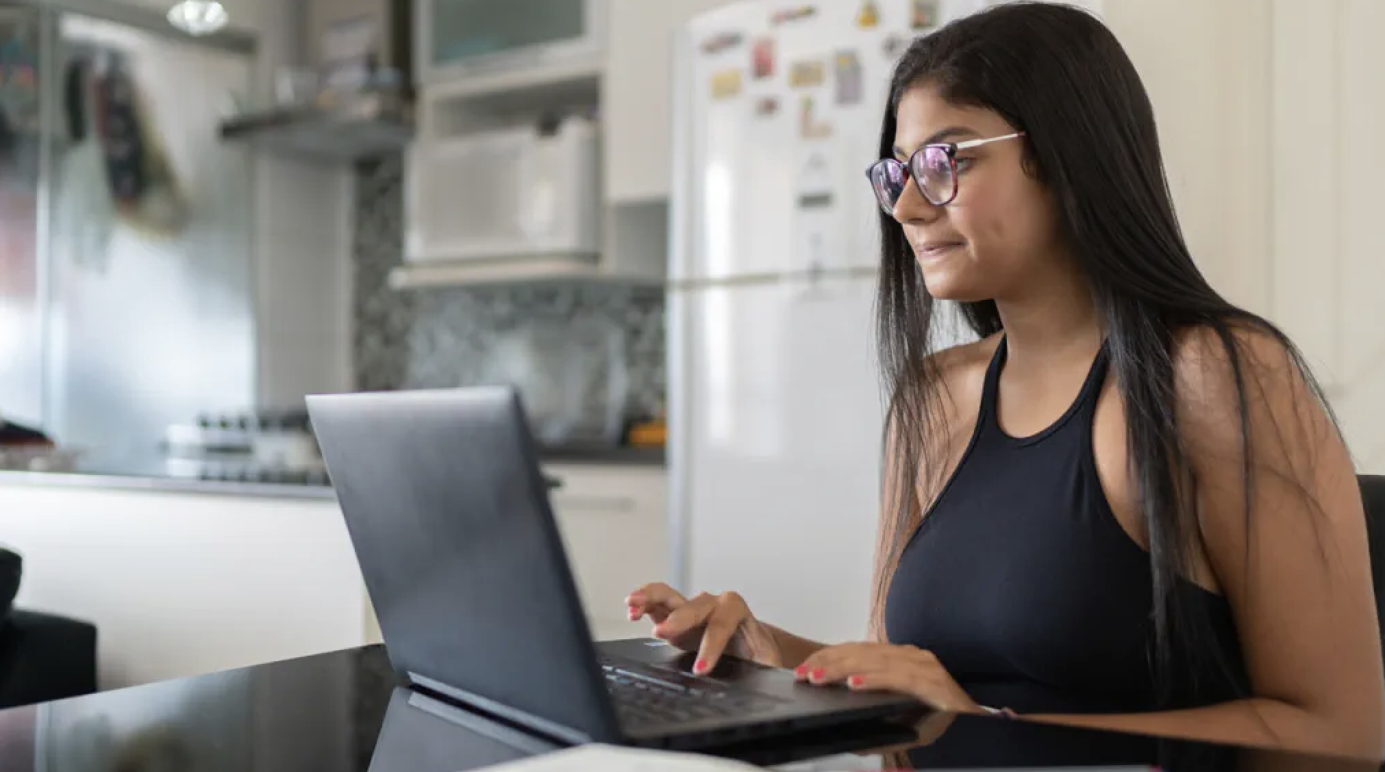 Photo of a Young lady on a laptop